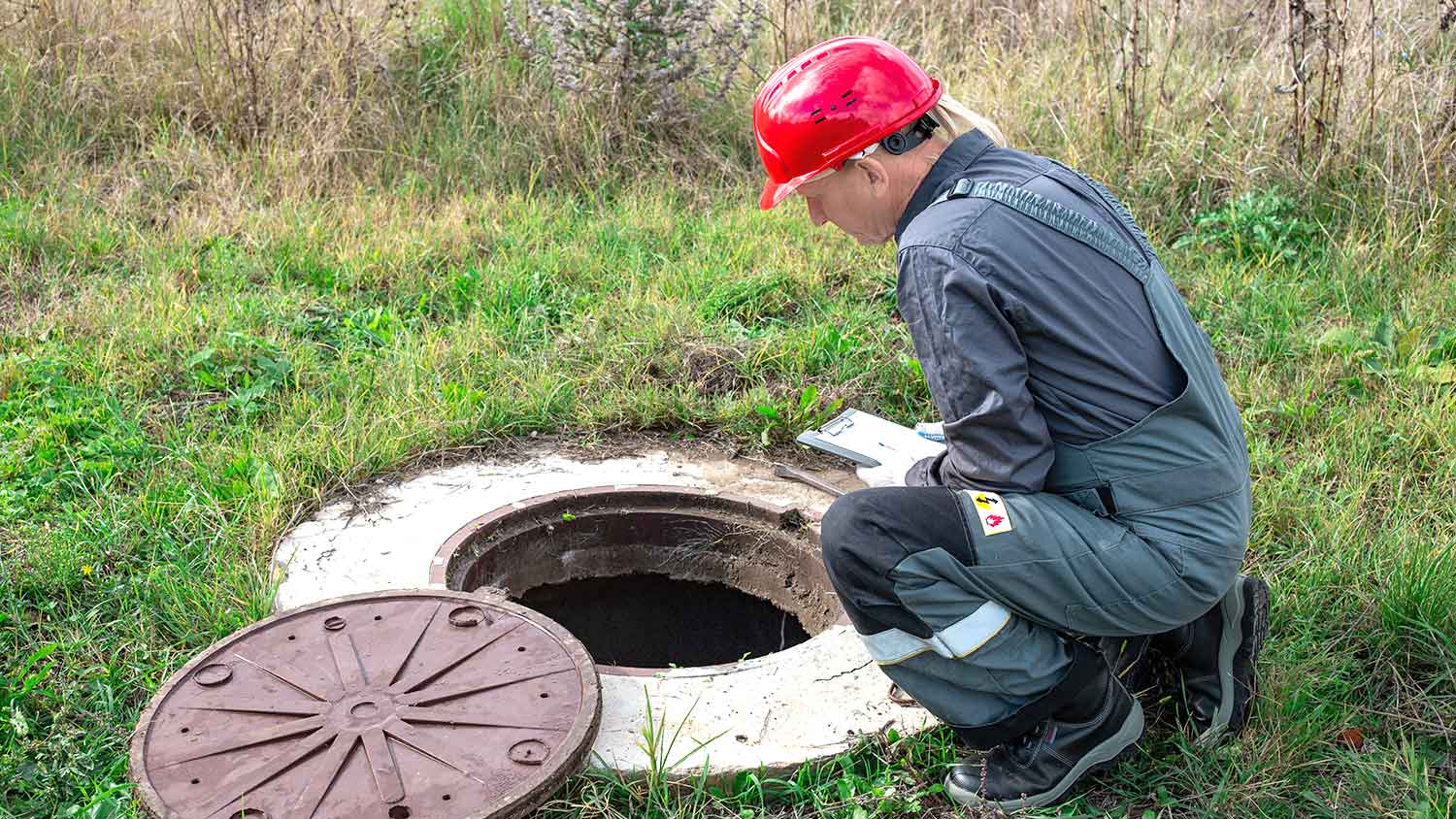 Inspector assessing water well system