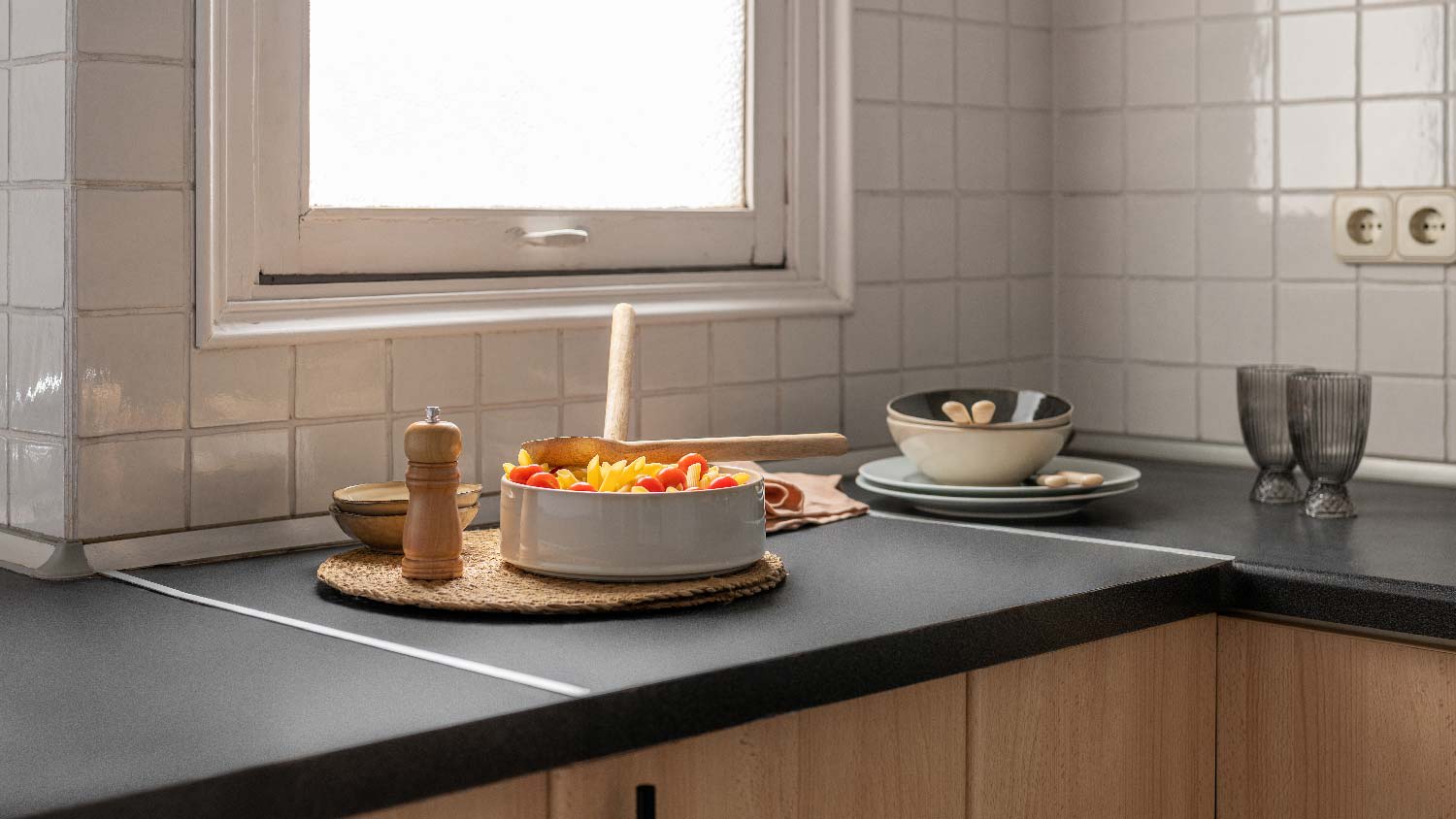 A recycled paper countertop with a salad bowl on it