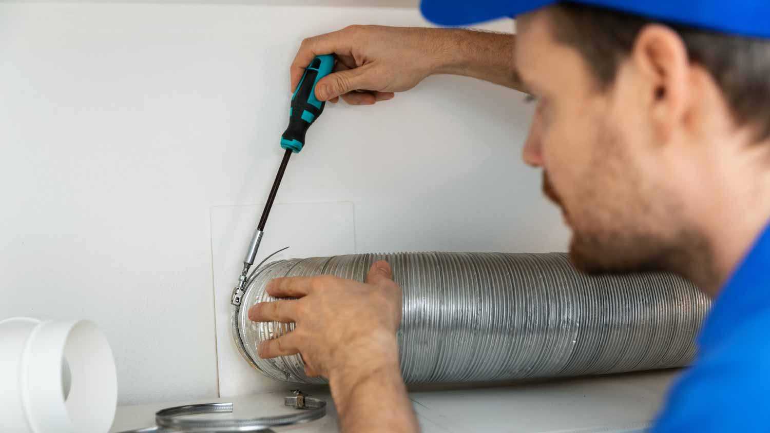 Worker installing flexible aluminum