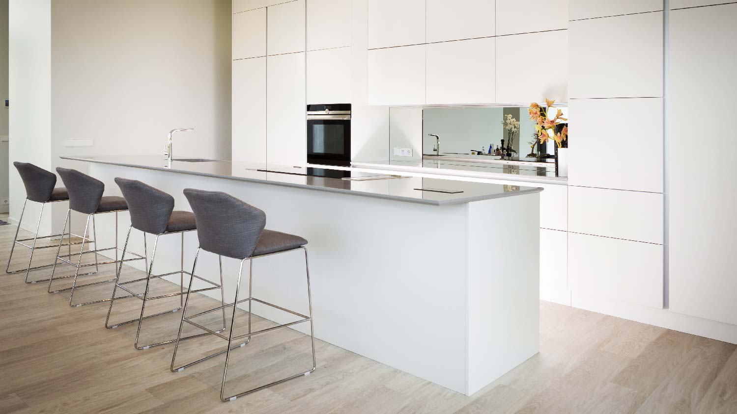 A modern kitchen with corian countertop