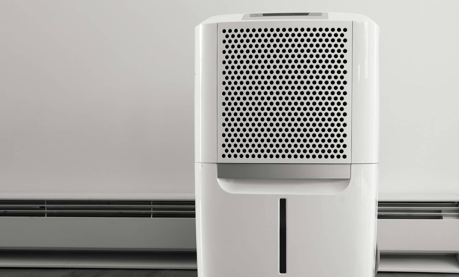 A small portable dehumidifier in basement