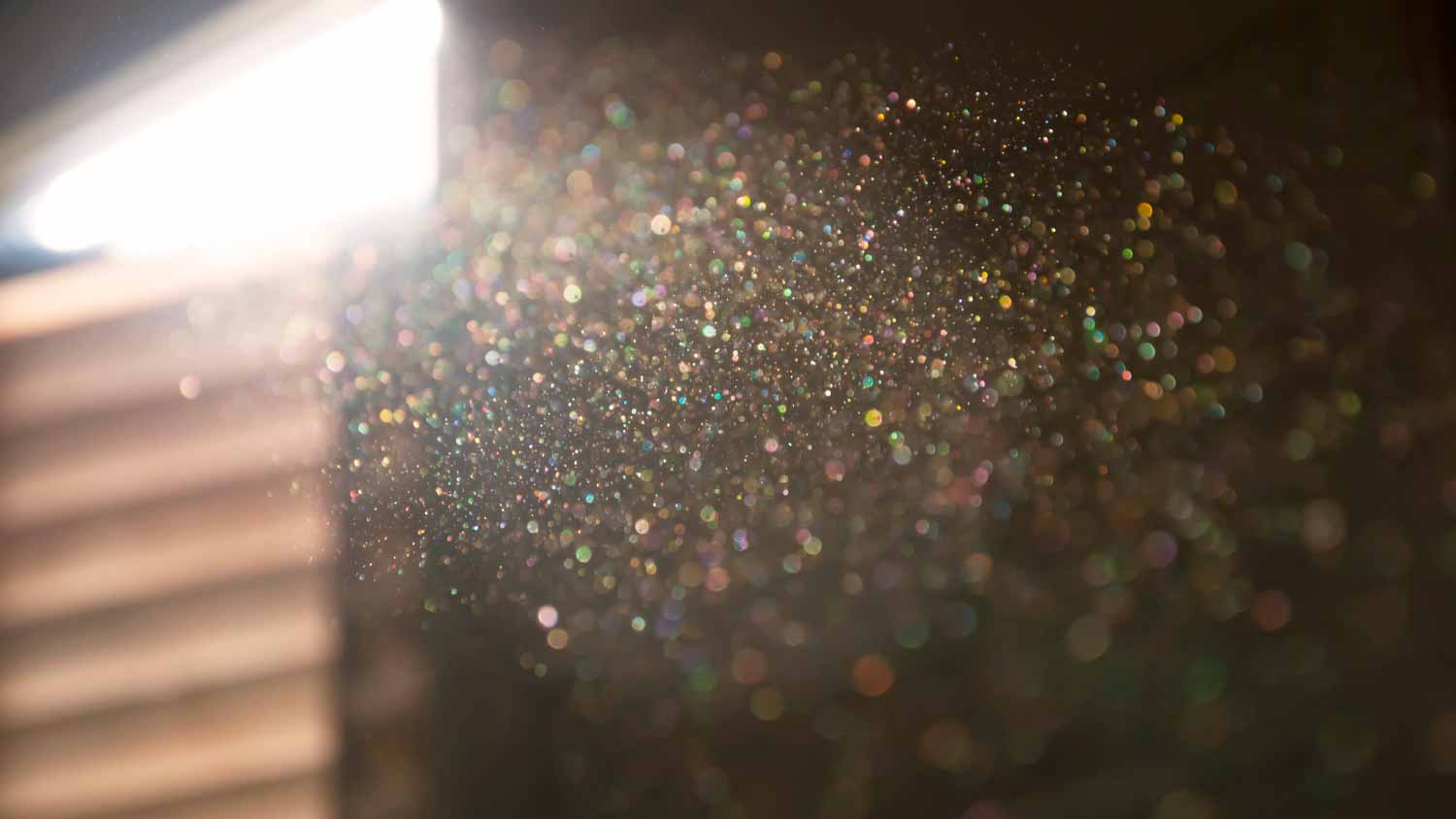 Dust on the inside of a dark room