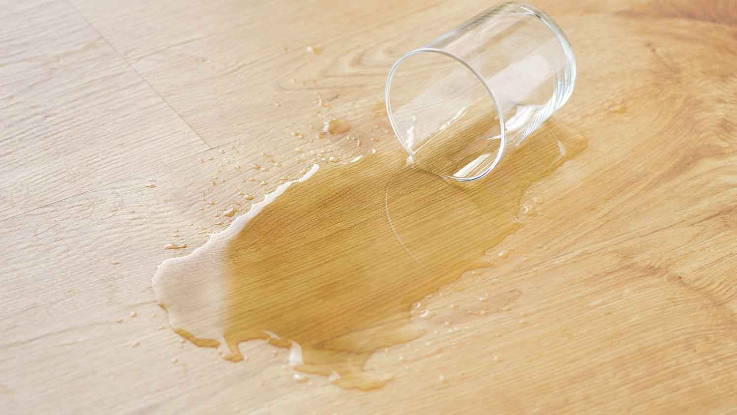 Glass and water spill on laminate flooring