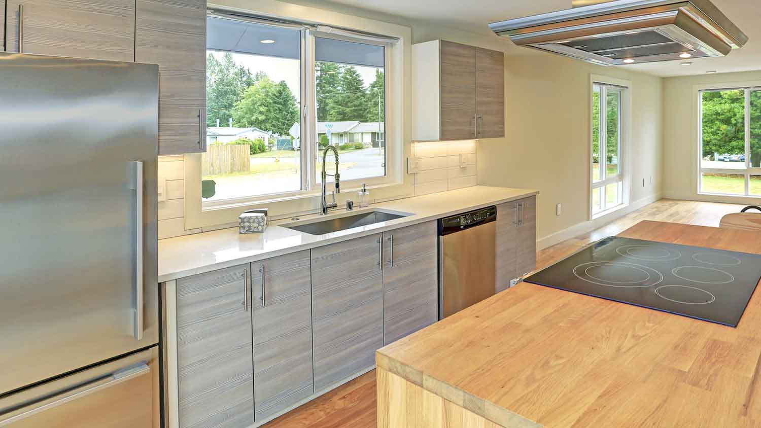 Kitchen with new whitewashed cabinets