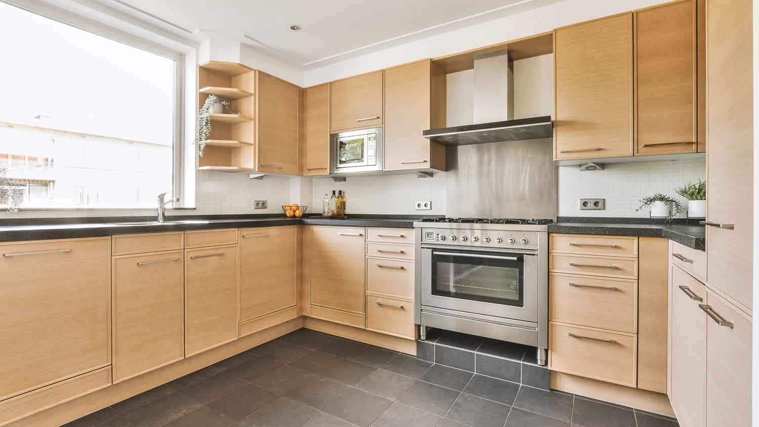 Modern kitchen with natural wood cabinets