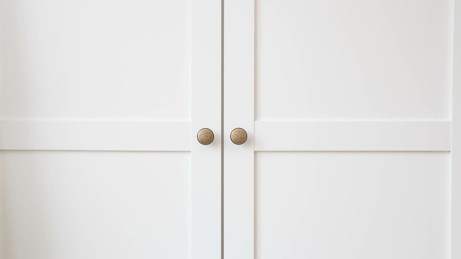A white cupboard wooden doors