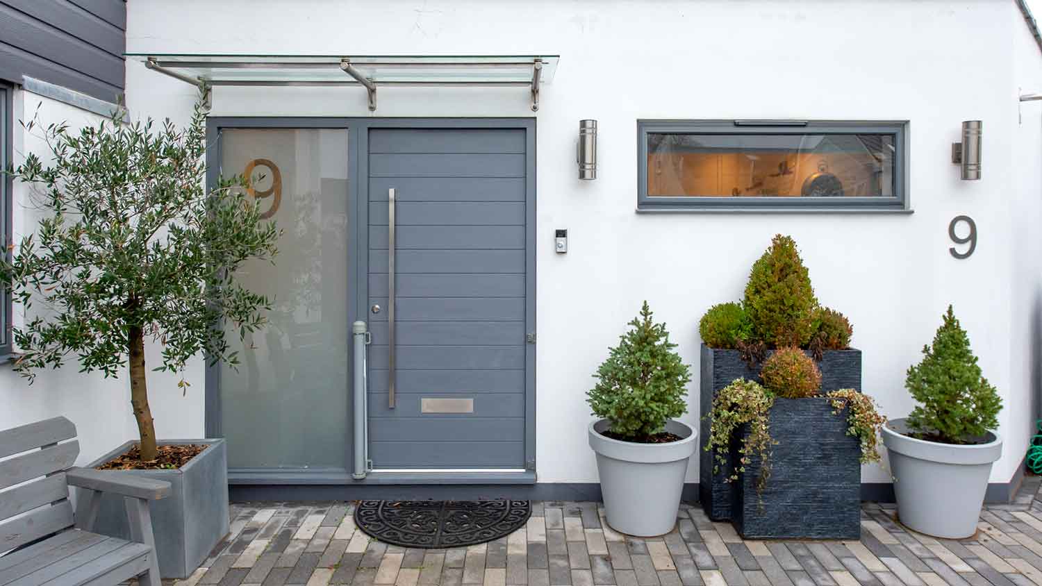 Modern house exterior with solid core front door