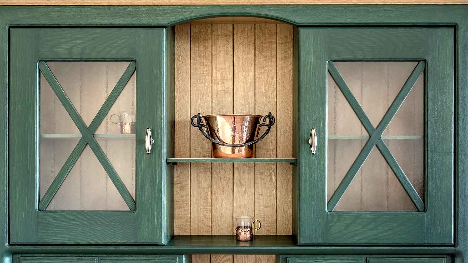Green stained wooden cabinets