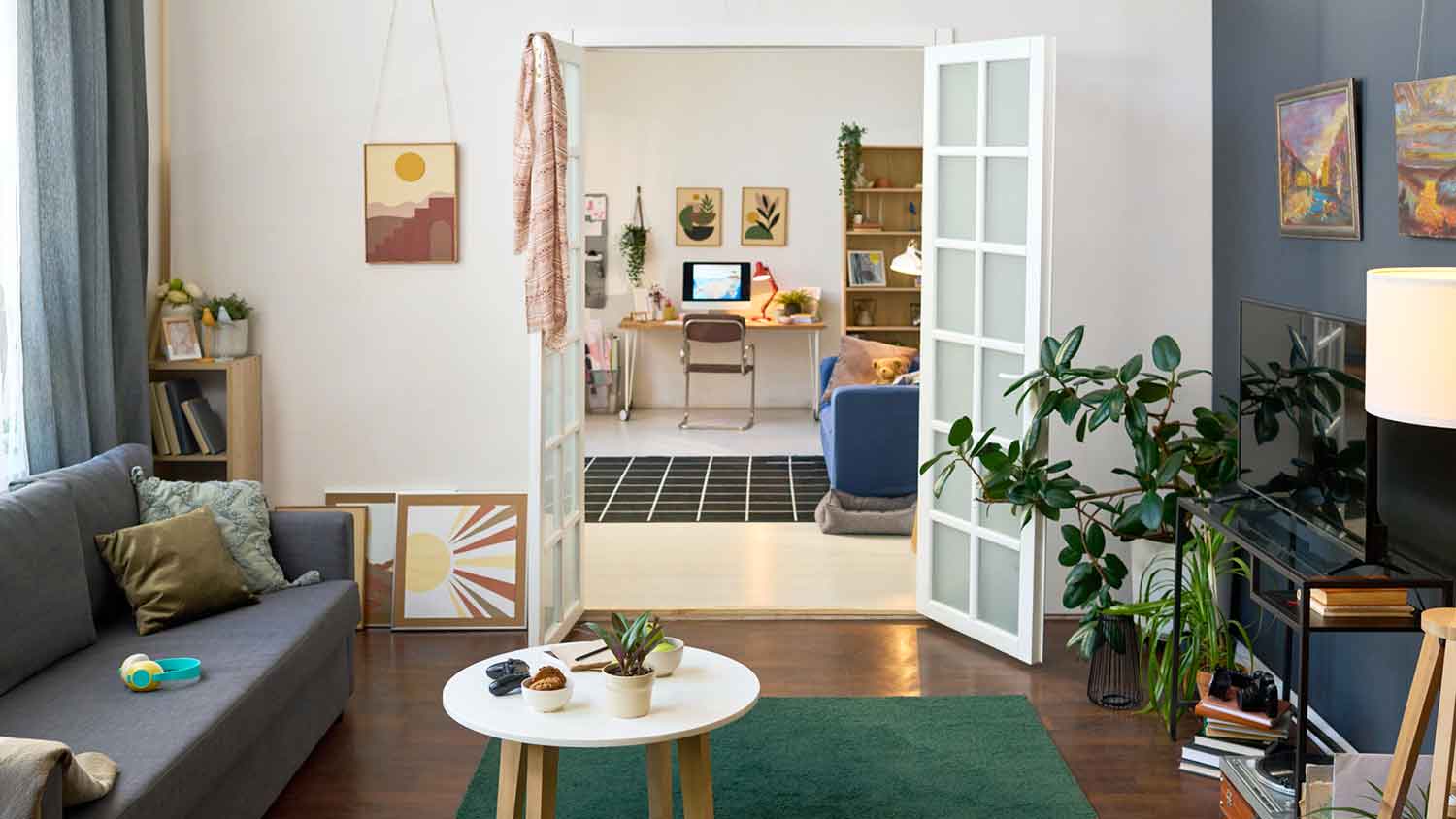 French doors installed between living room and studio