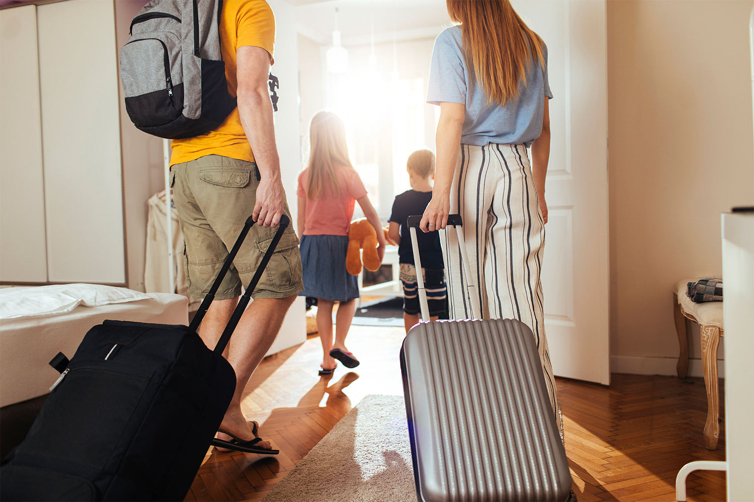 family leaving home for vacation