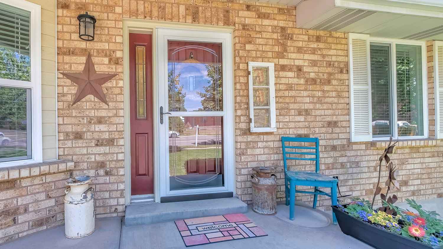 Glass storm door installed at the front door