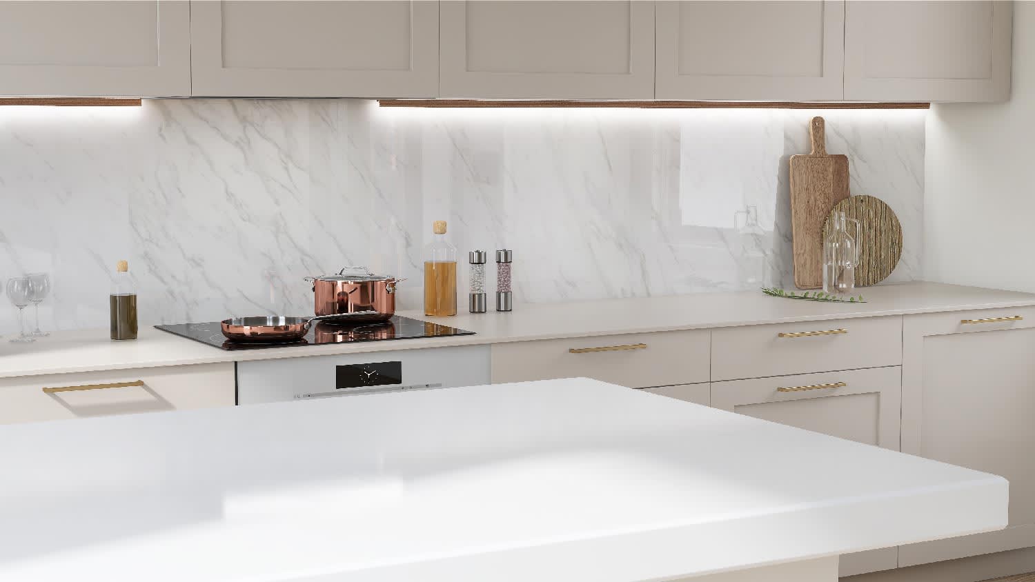 A kitchen with white countertops and glass ceramic stove top
