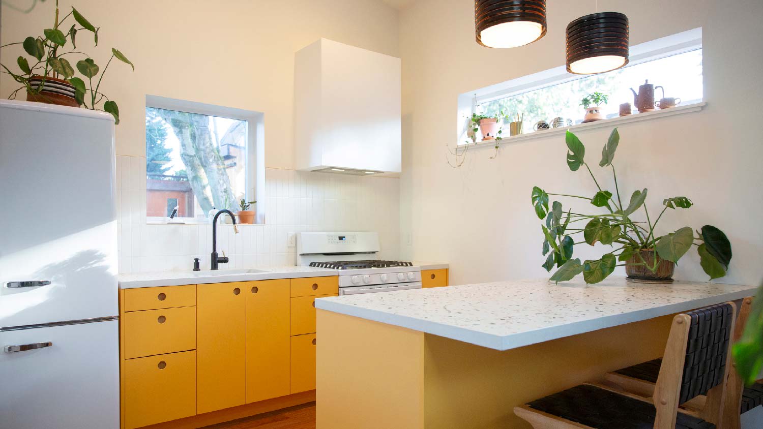 A modern kitchen with a solid surface countertop