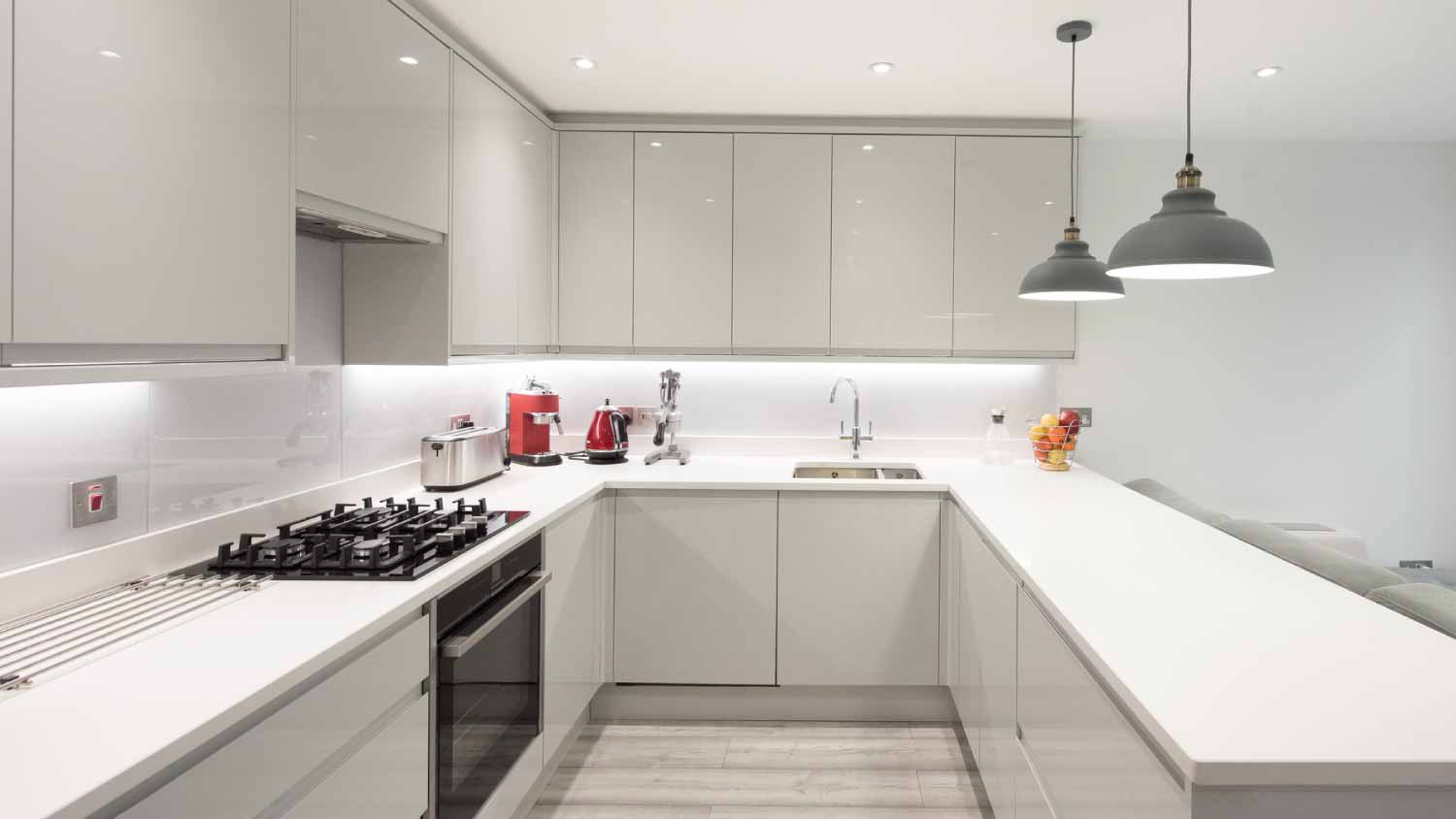 Interior view of a new light gray kitchen