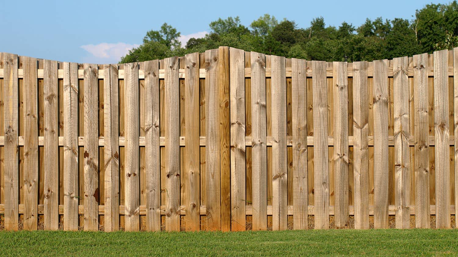 Wooden board on board fence boarding yard