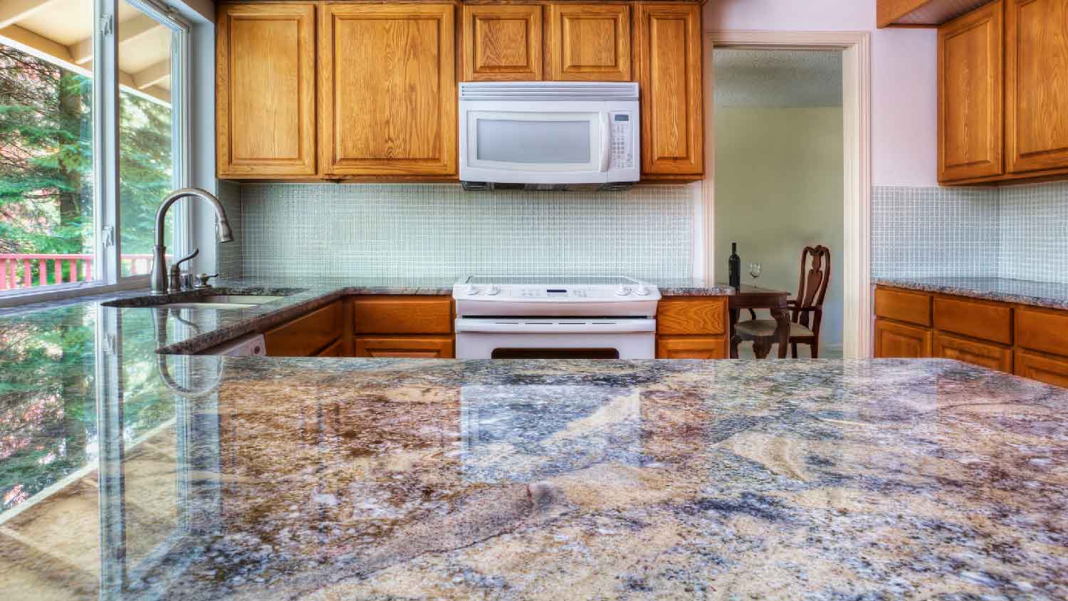 A kitchen with blue granite countertop
