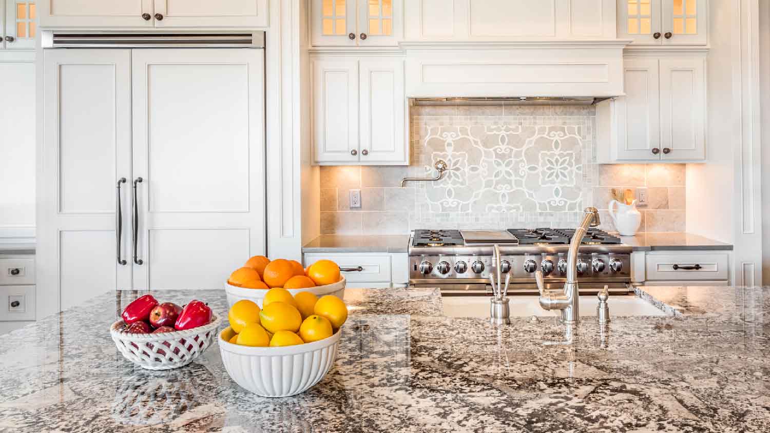 A luxurious kitchen with granite countertops