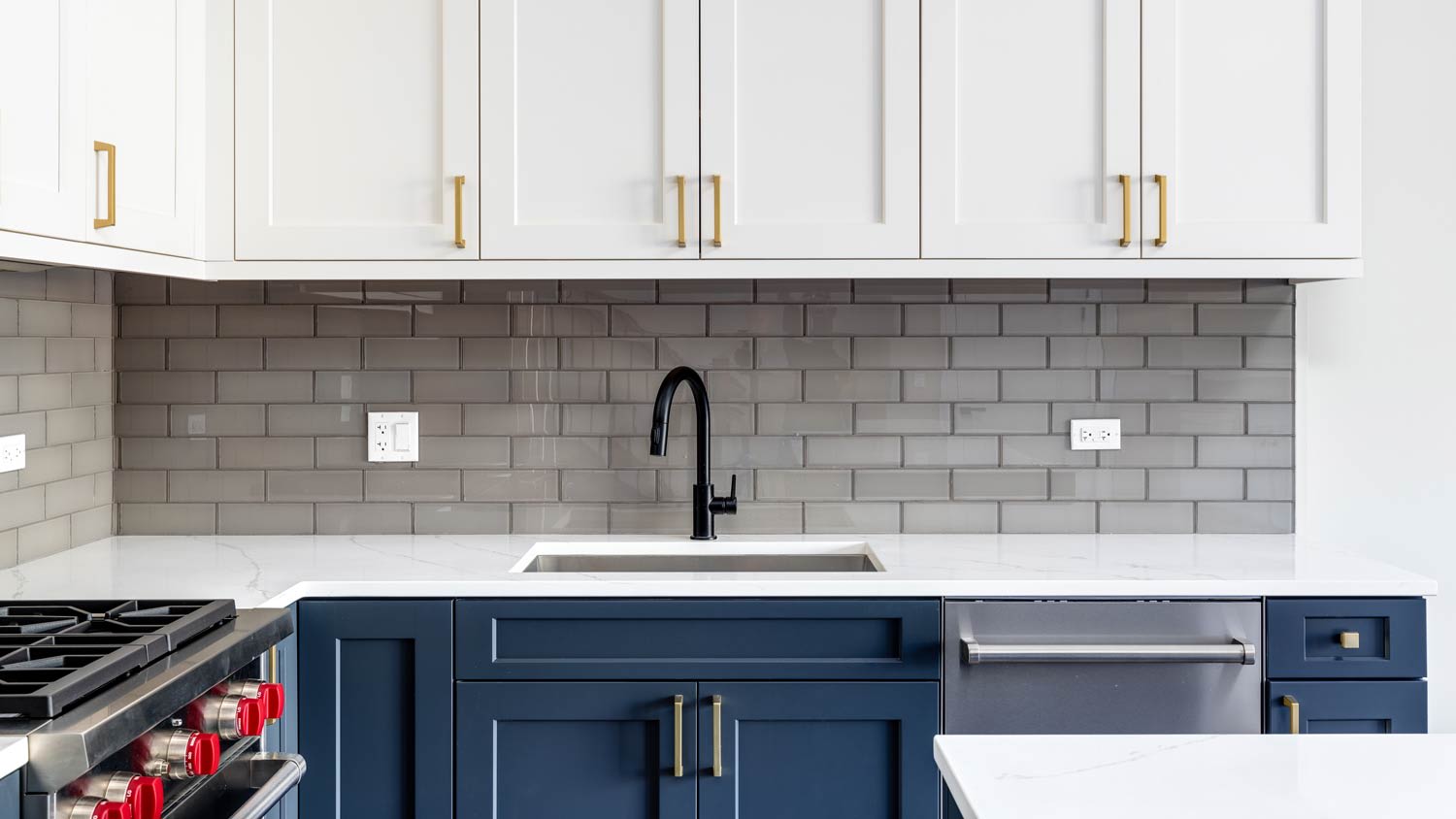 kitchen with white and blue cabinets