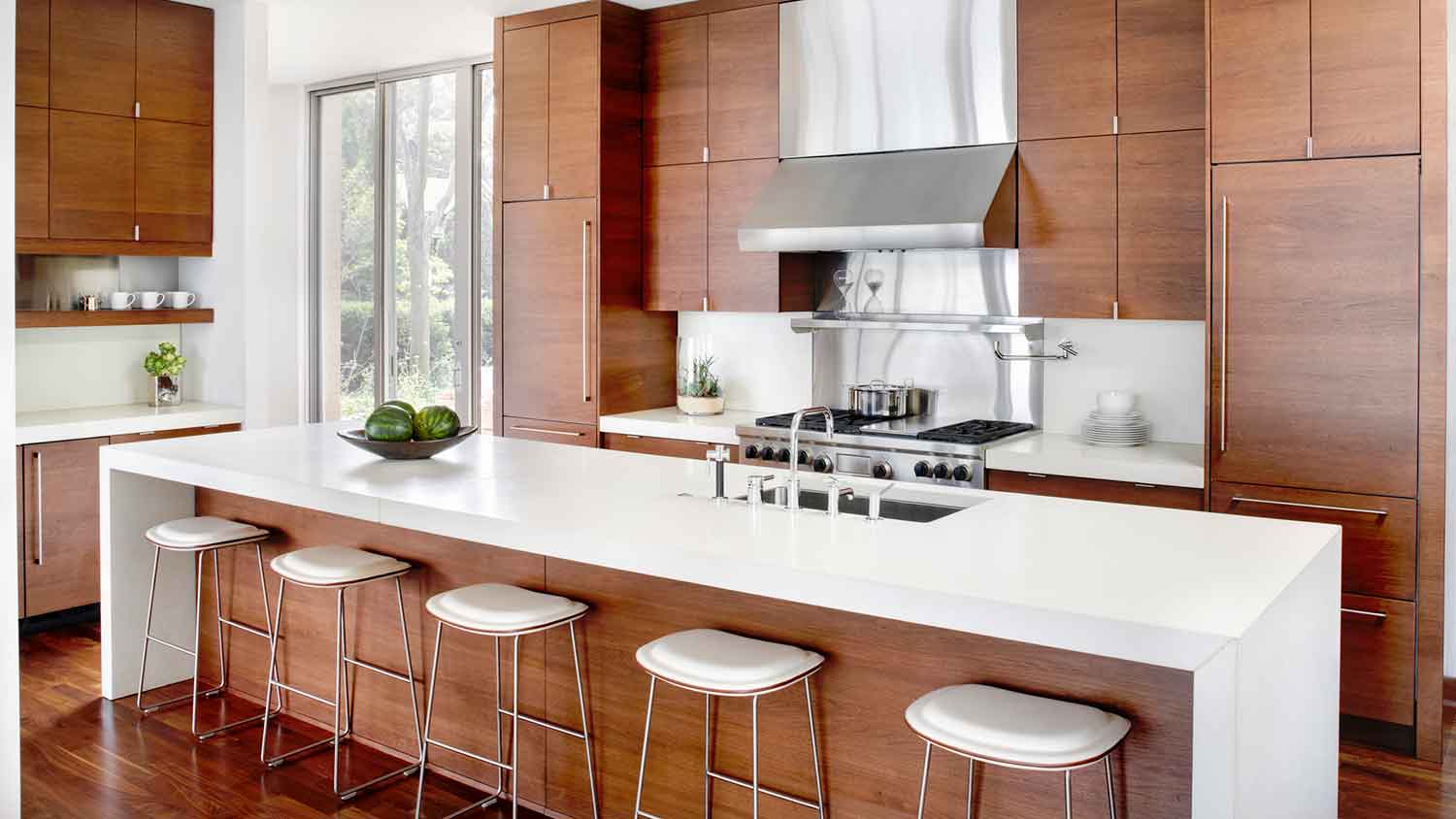 Modern kitchen with white concrete countertops
