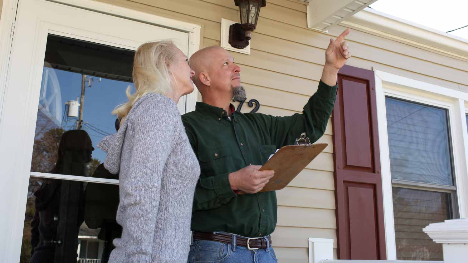 Contractor talking with homeowner