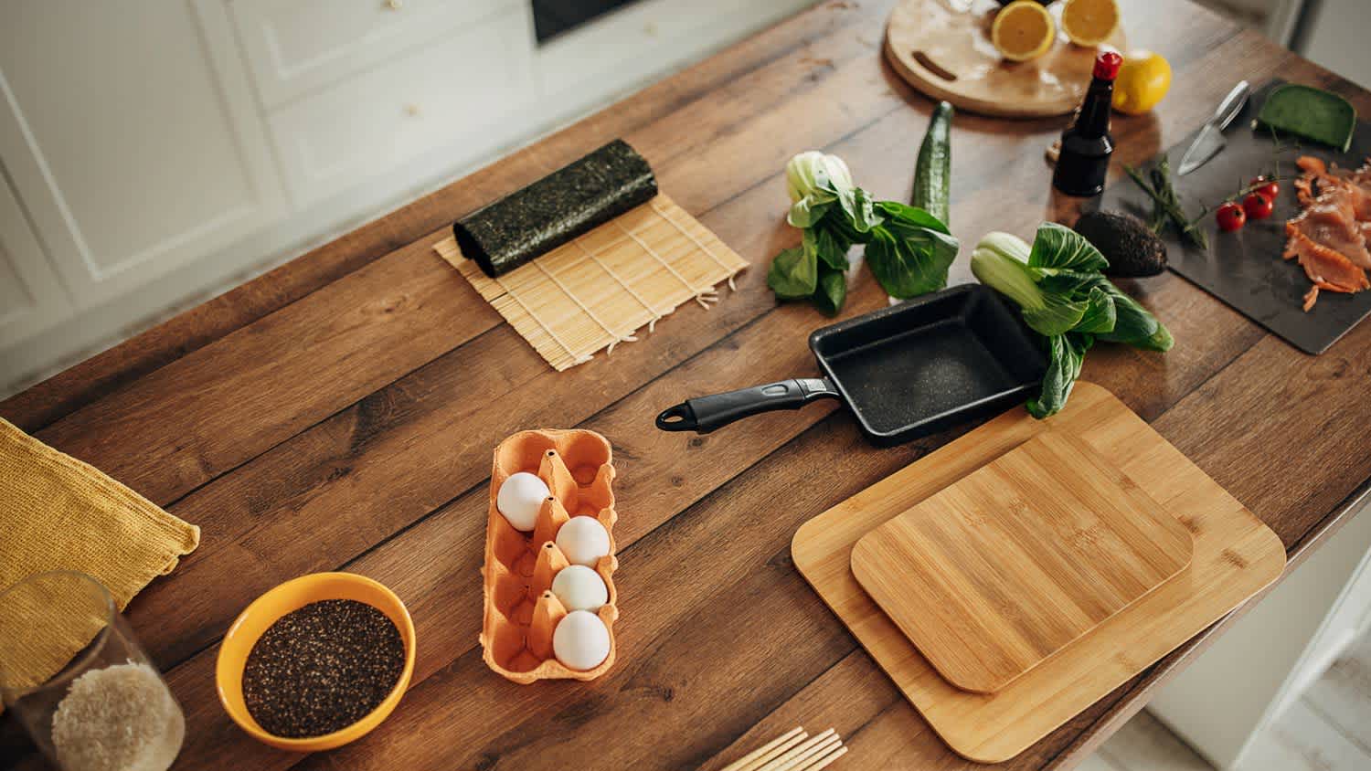 Wooden countertop covered with food