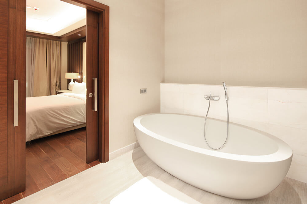 Luxury bathroom with sliding pocket doors