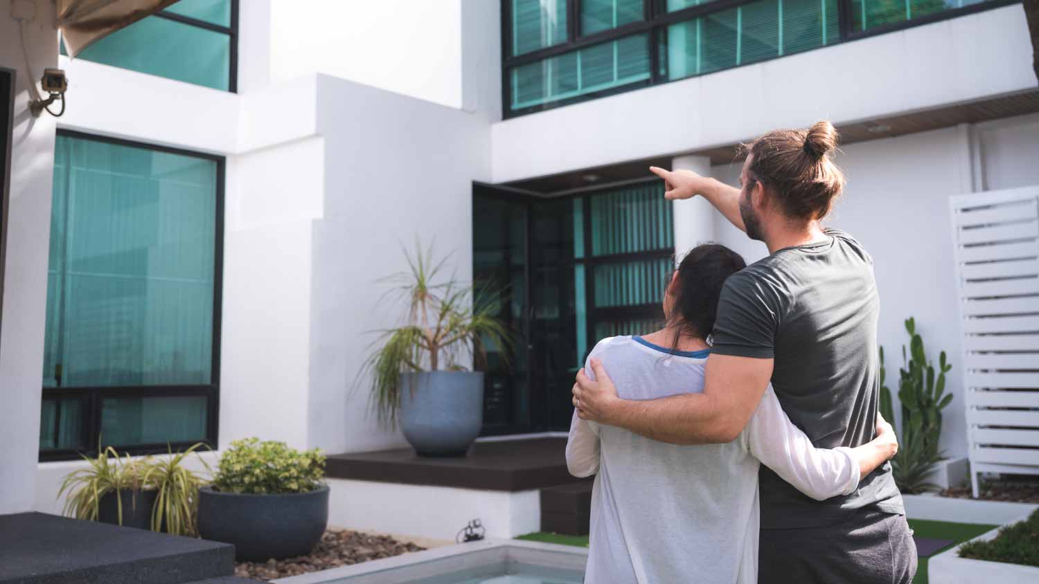 man and woman hugging