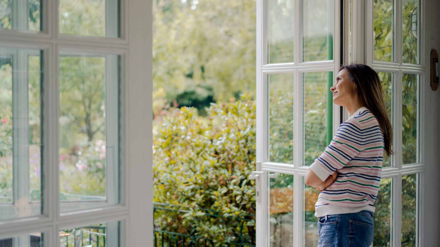 Woman looking out of terrace