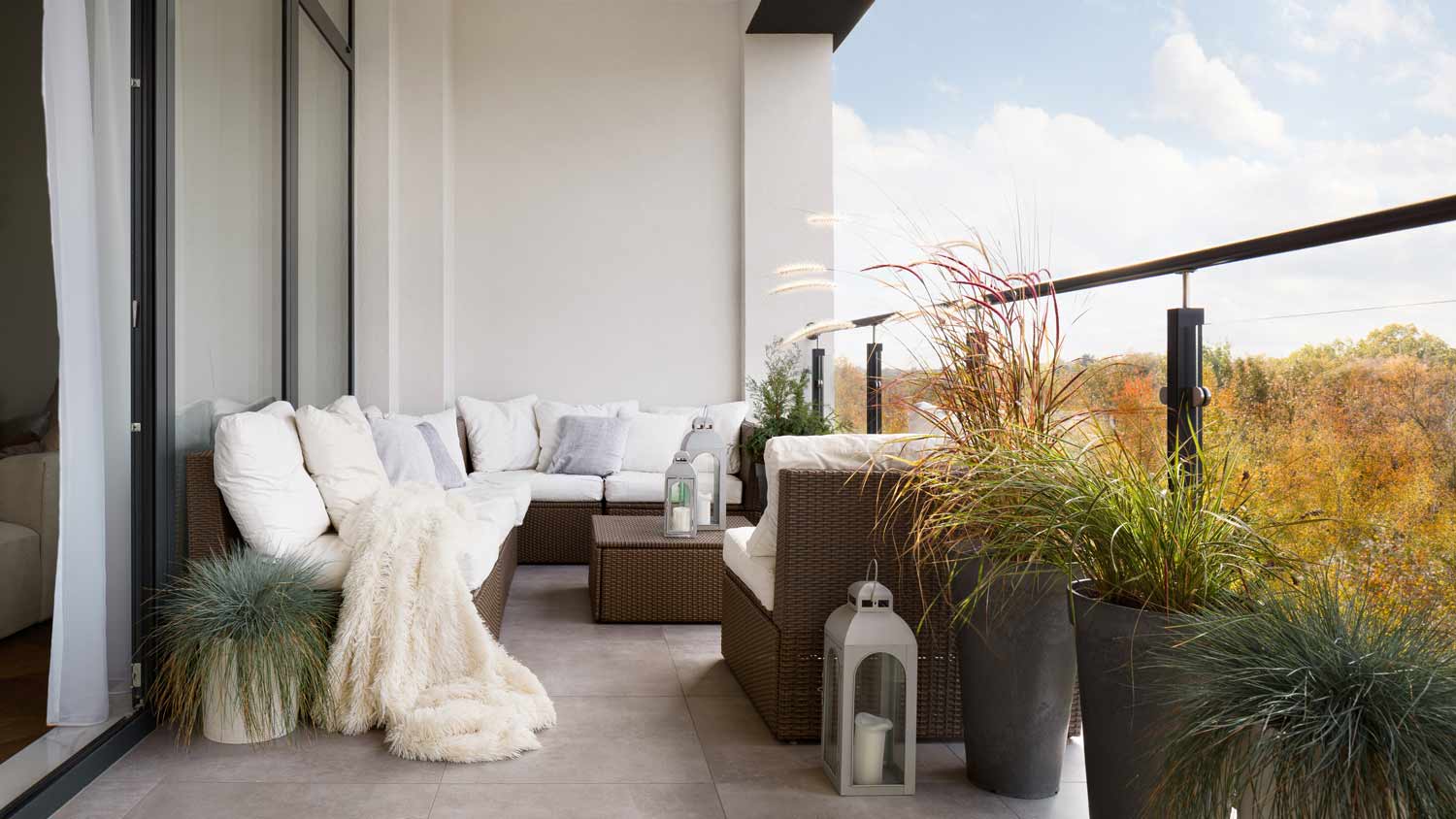 balcony decorated with elegant outdoor furniture