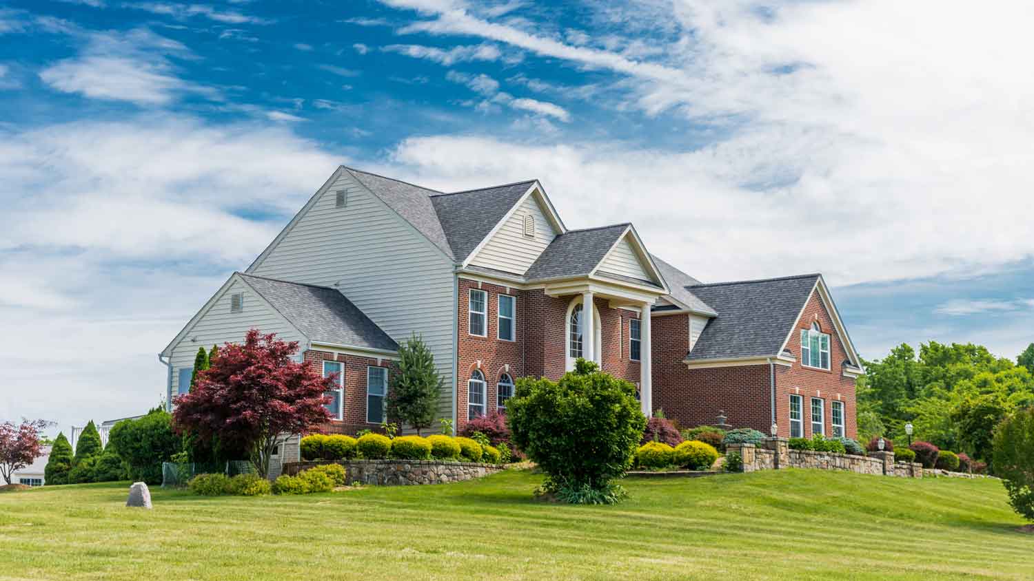 A suburban house with a sunny day
