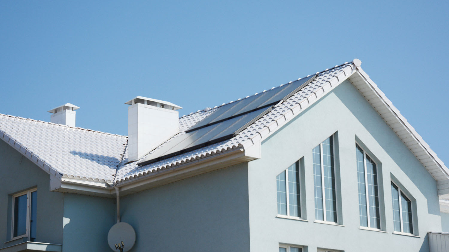 The exterior of a house with a cool roof