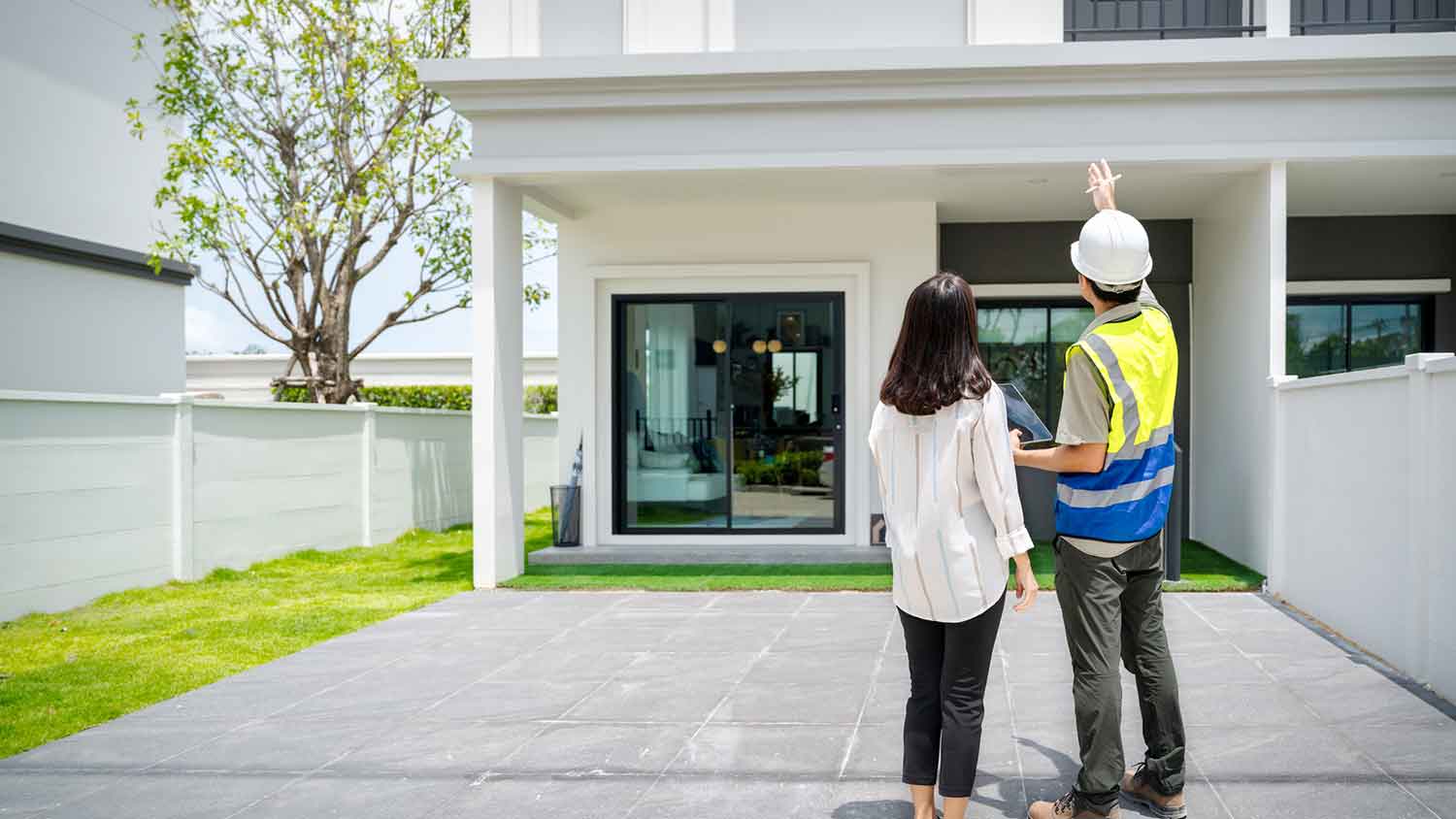 Home inspector discussing structural issues with client