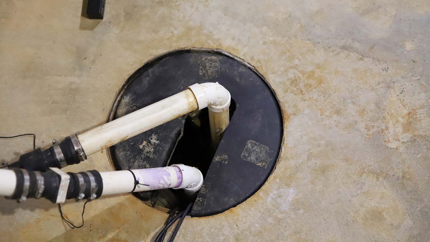 A sump pump in a basement
