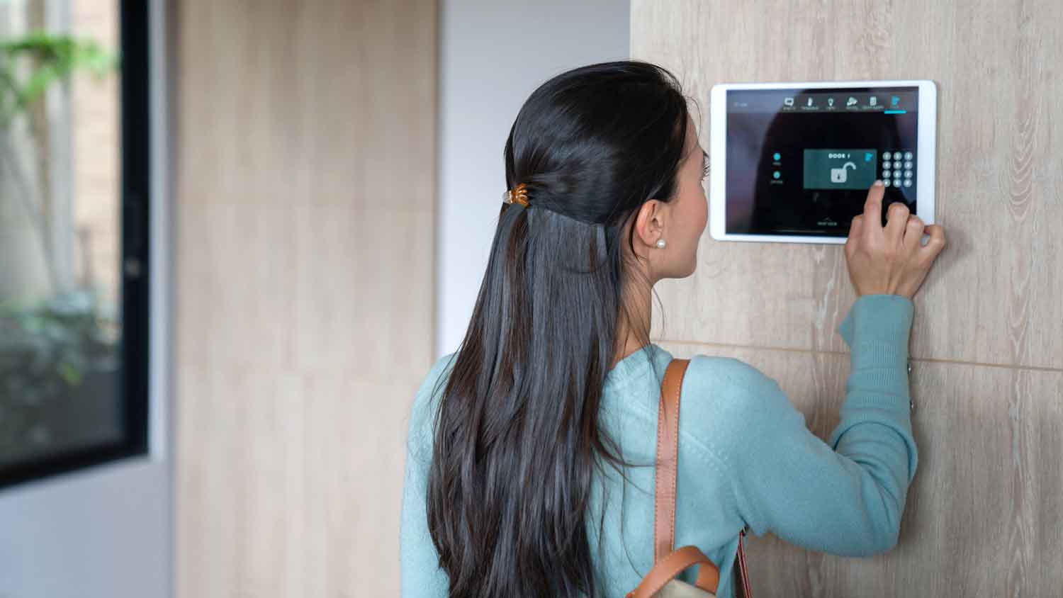 Woman returning home deactivates home alarm system
