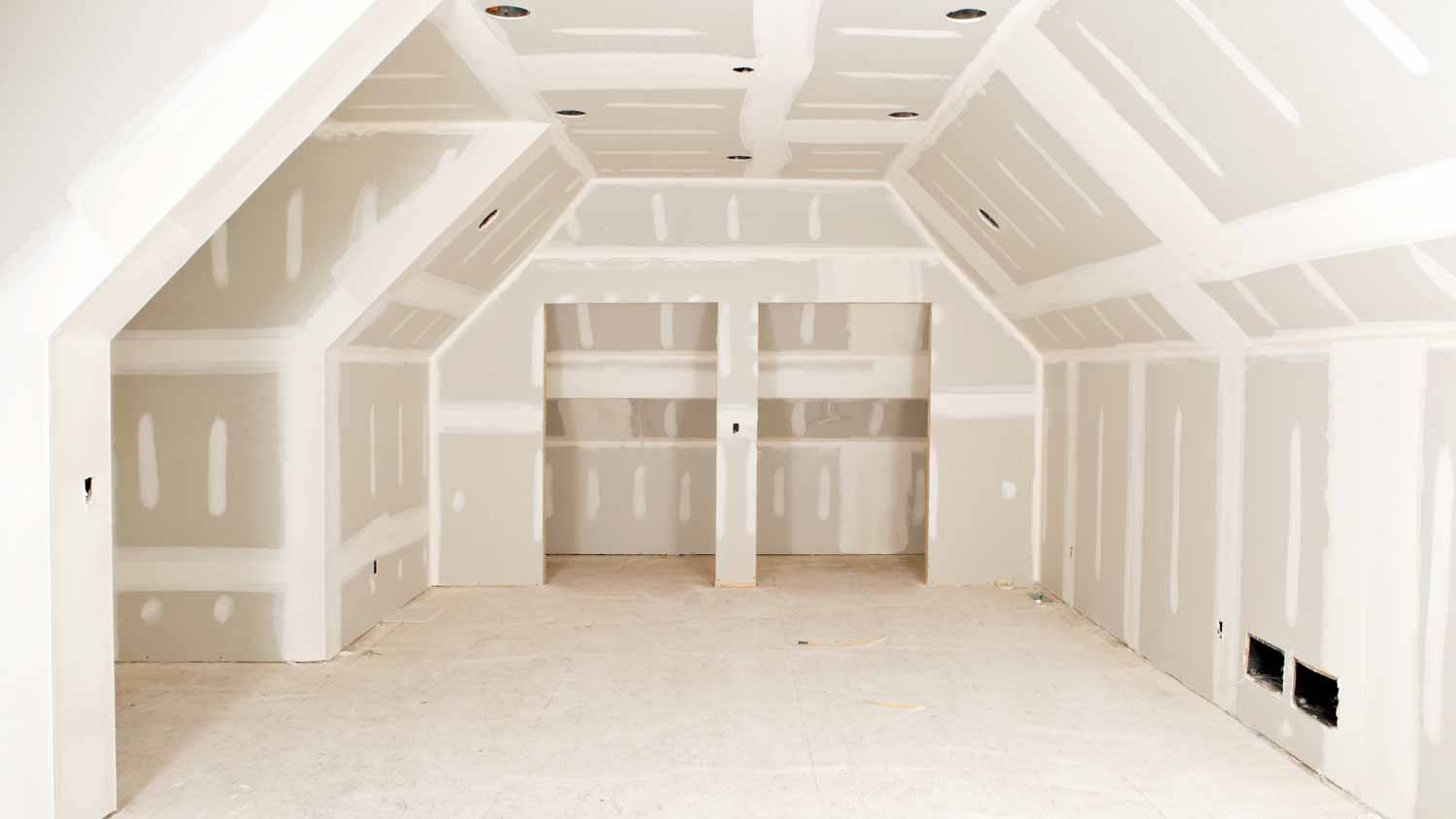 Construction site with tape and mud on the drywall
