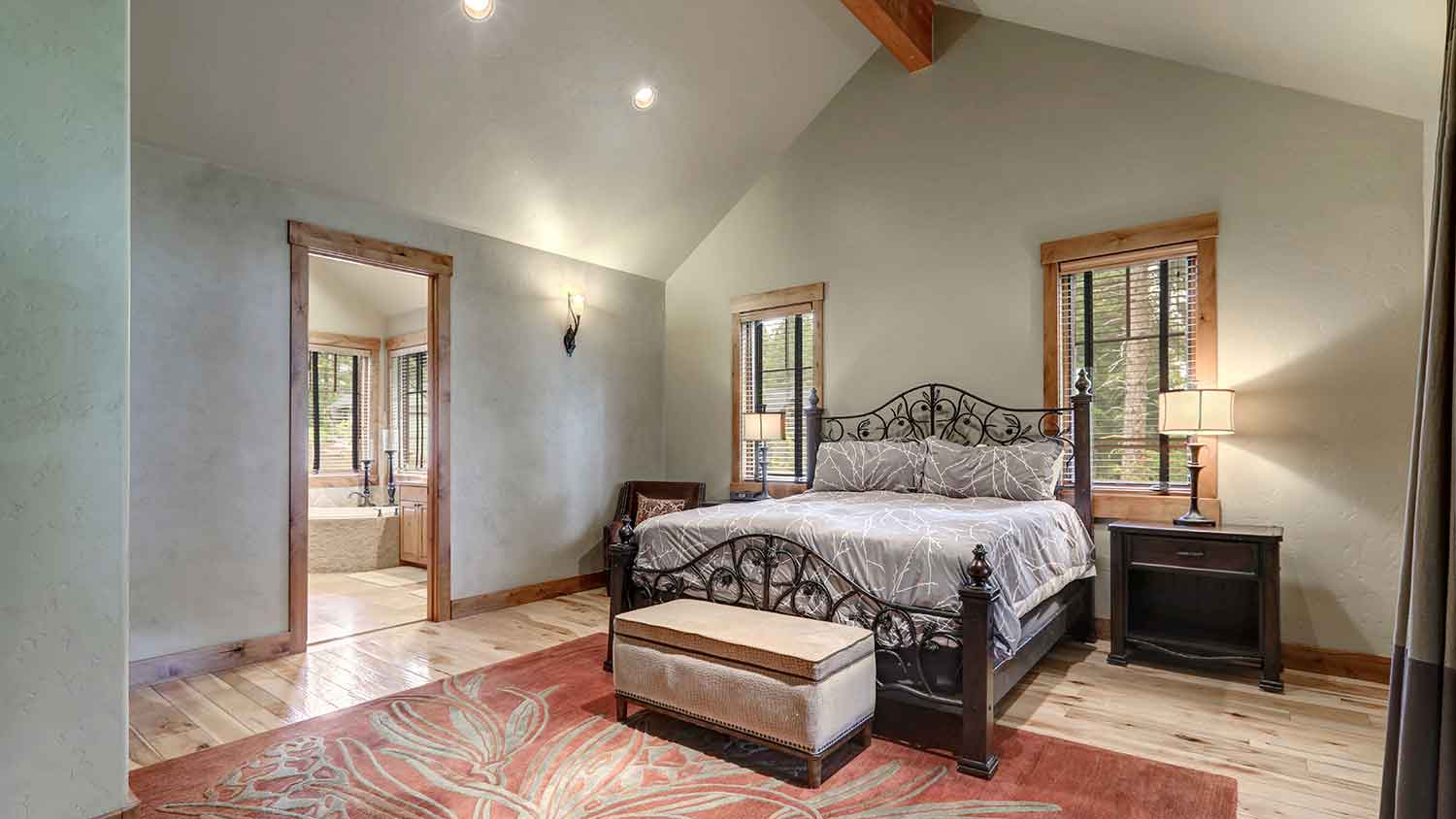 Master bedroom with gray plastered walls