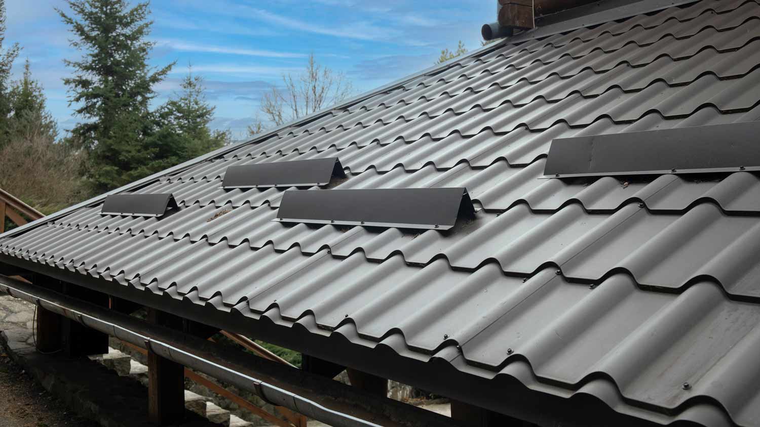 grey metal roof with snow guards