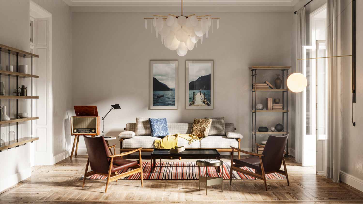 A living room with sofa, armchairs and a beautiful chandelier