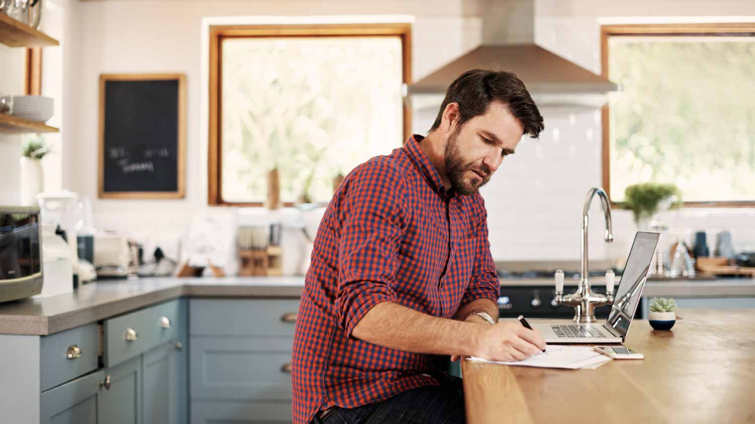 Man checking bills
