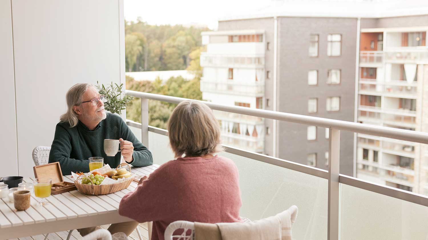Couple having breakfast in the balcony