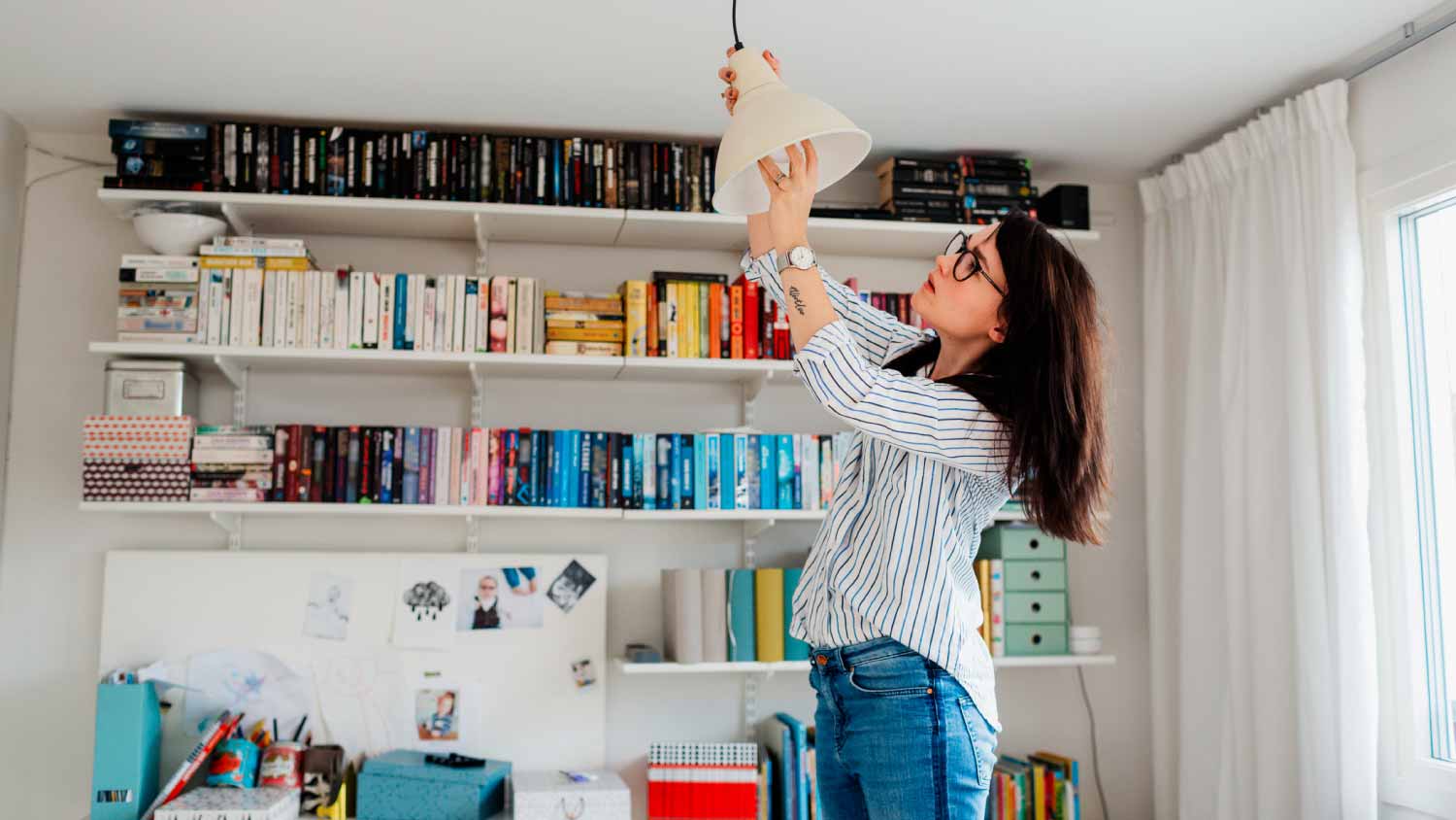 Woman changing bulb