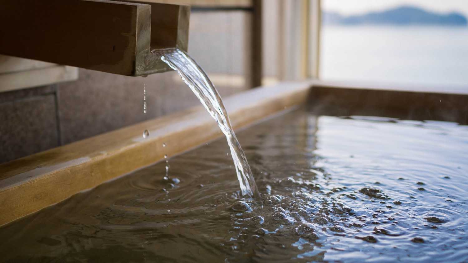 Hot water running in a bathtub