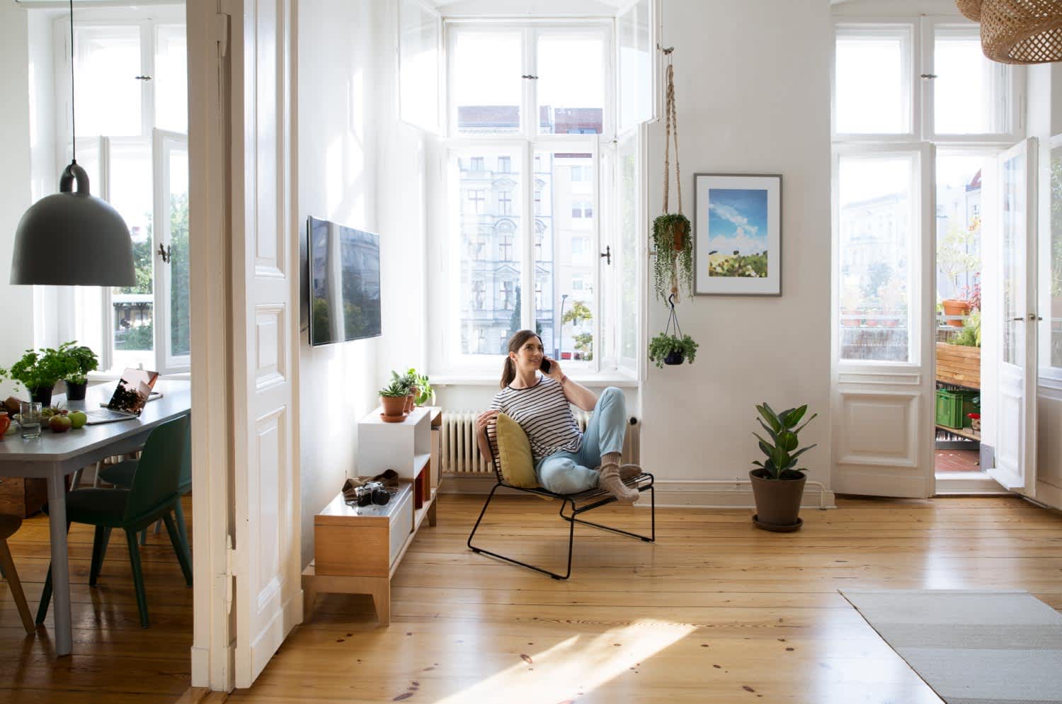 A woman at home sitting in her chair