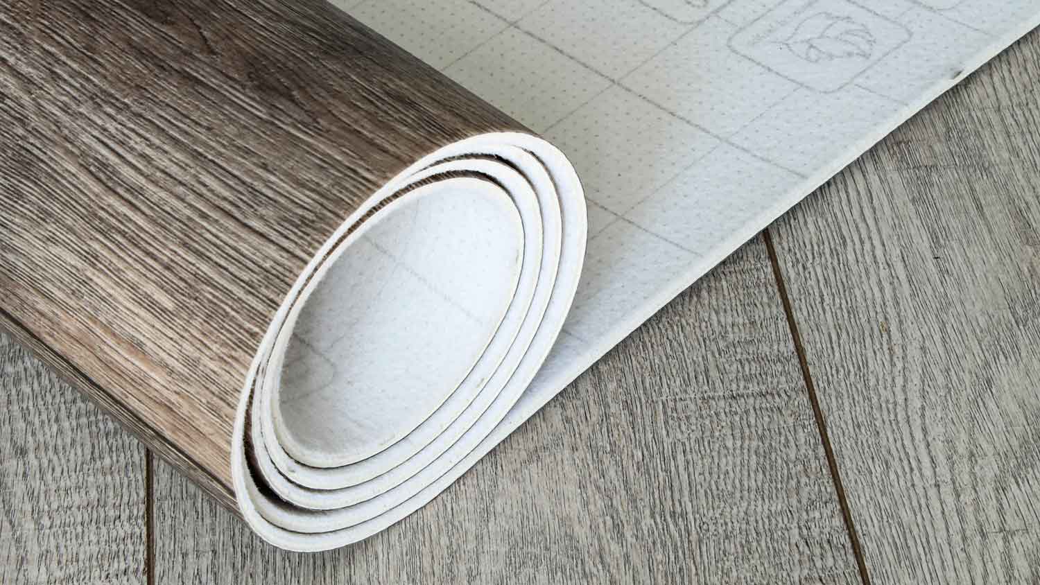 Roll of sheet vinyl flooring with wooden texture