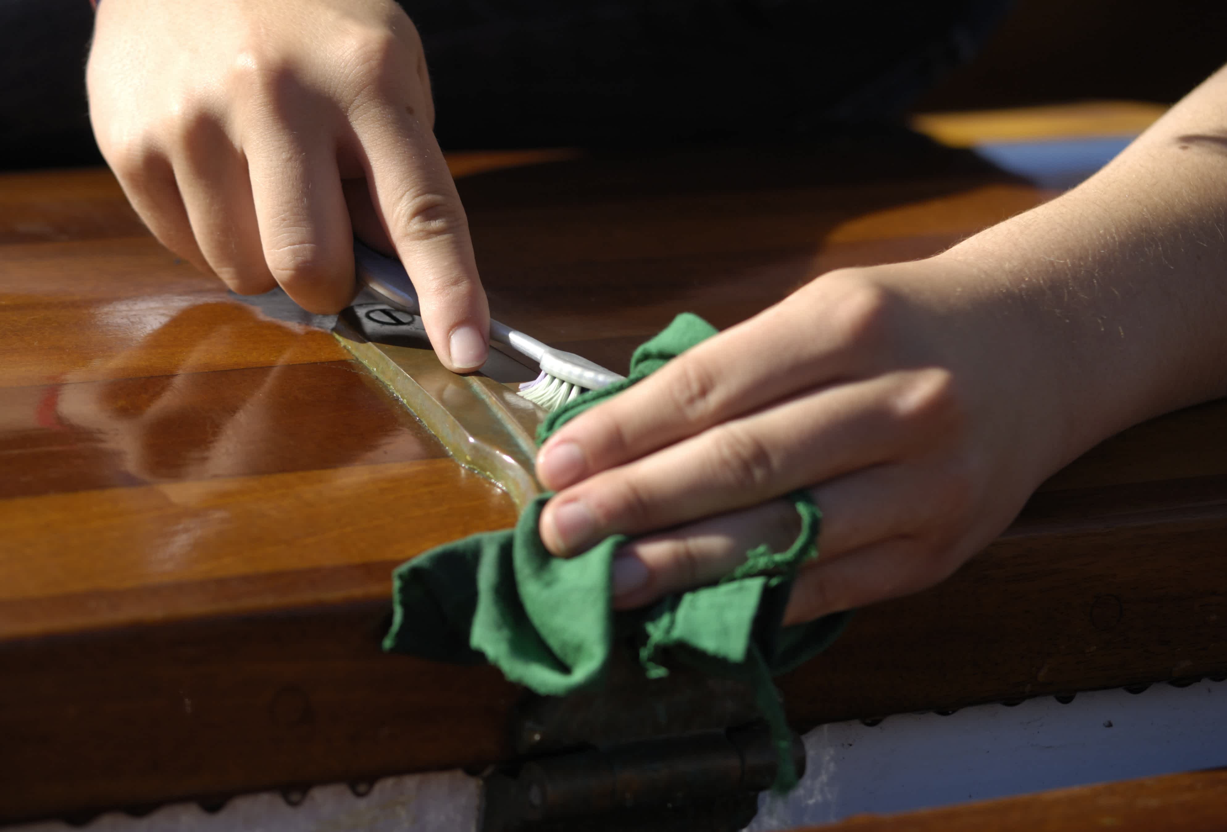 Cleaning brass using a toothbrush and cloth