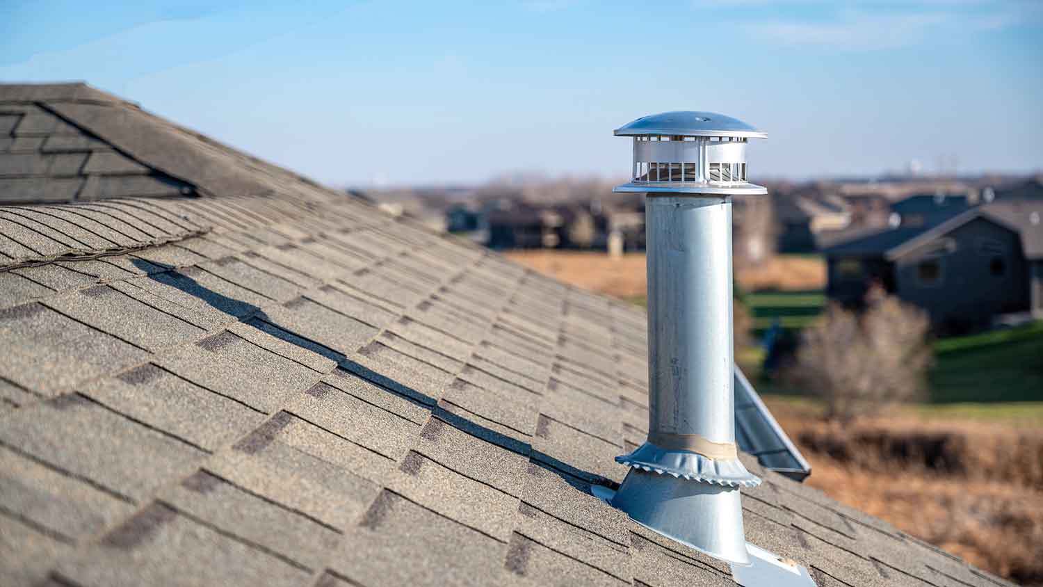Furnace exhaust pipe on the house roof