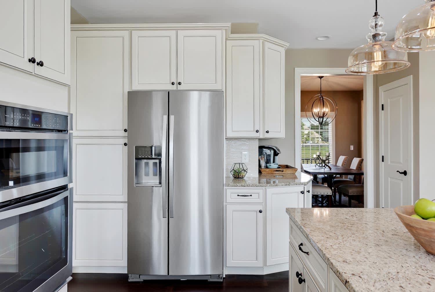 A refrigerator in a new kitchen