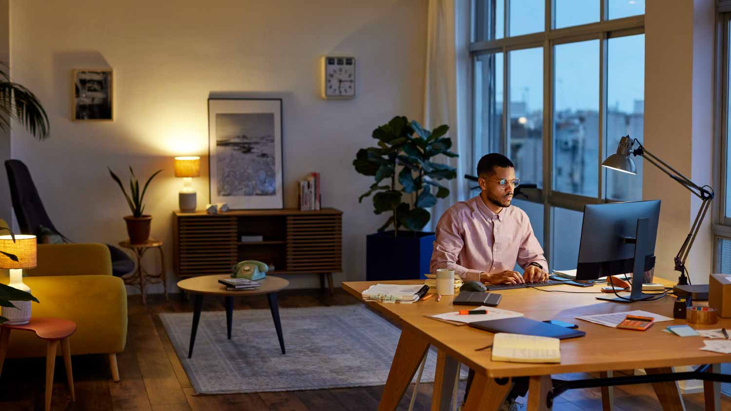 Man using computer in the living room