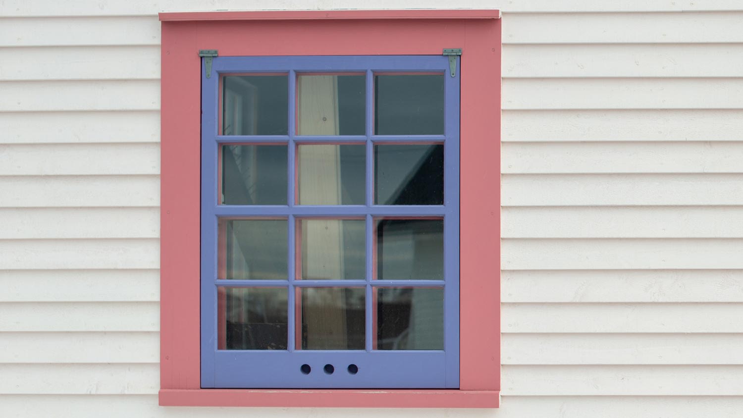 A vintage colorful storm window
