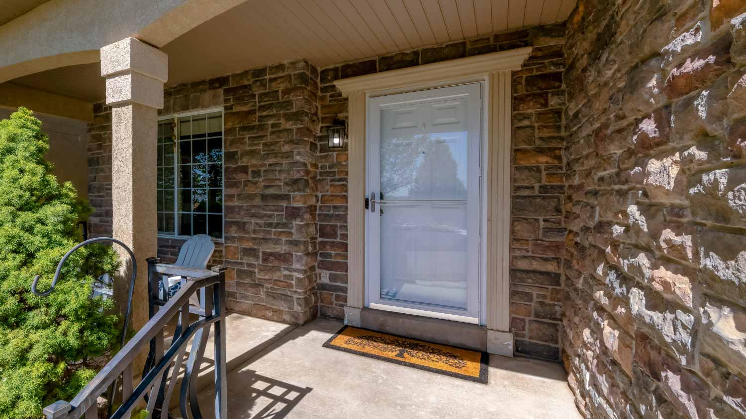 White front door with glass storm door